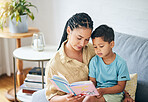 Book, reading and woman with child on couch for storytelling in living room of happy home, teaching and bonding fun. Love, learning and mom with kid, fantasy story on sofa and quality time together.