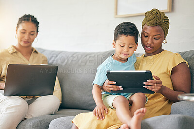 Buy stock photo Relax, tablet and family kid, mom or bisexual people reading online web story, e learning article and distance education. LGBTQ, lesbian mothers or relax gay woman teaching child on home lounge sofa