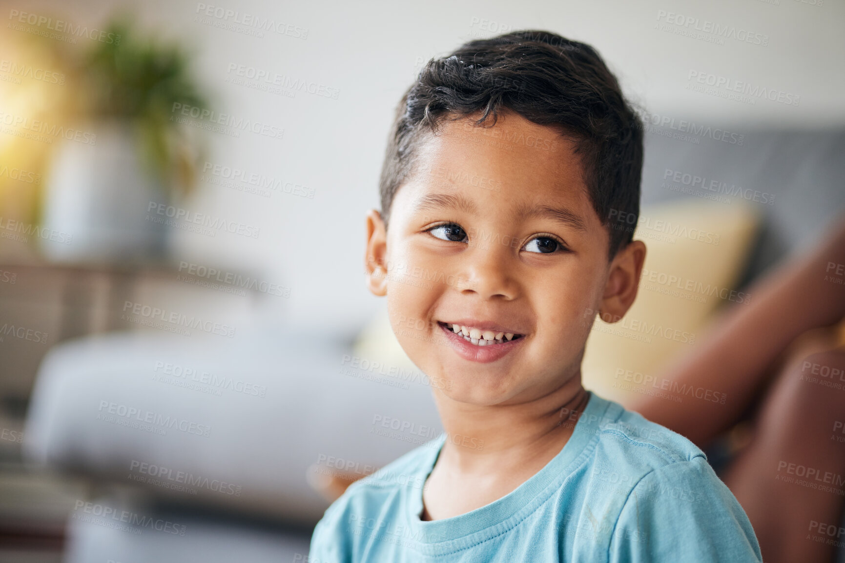 Buy stock photo Kid, smile and happy in family home in the morning with thinking feeling relax in living room. Lens flare, face and house with young child, boy and cute son from Brazil on weekend with joy and youth