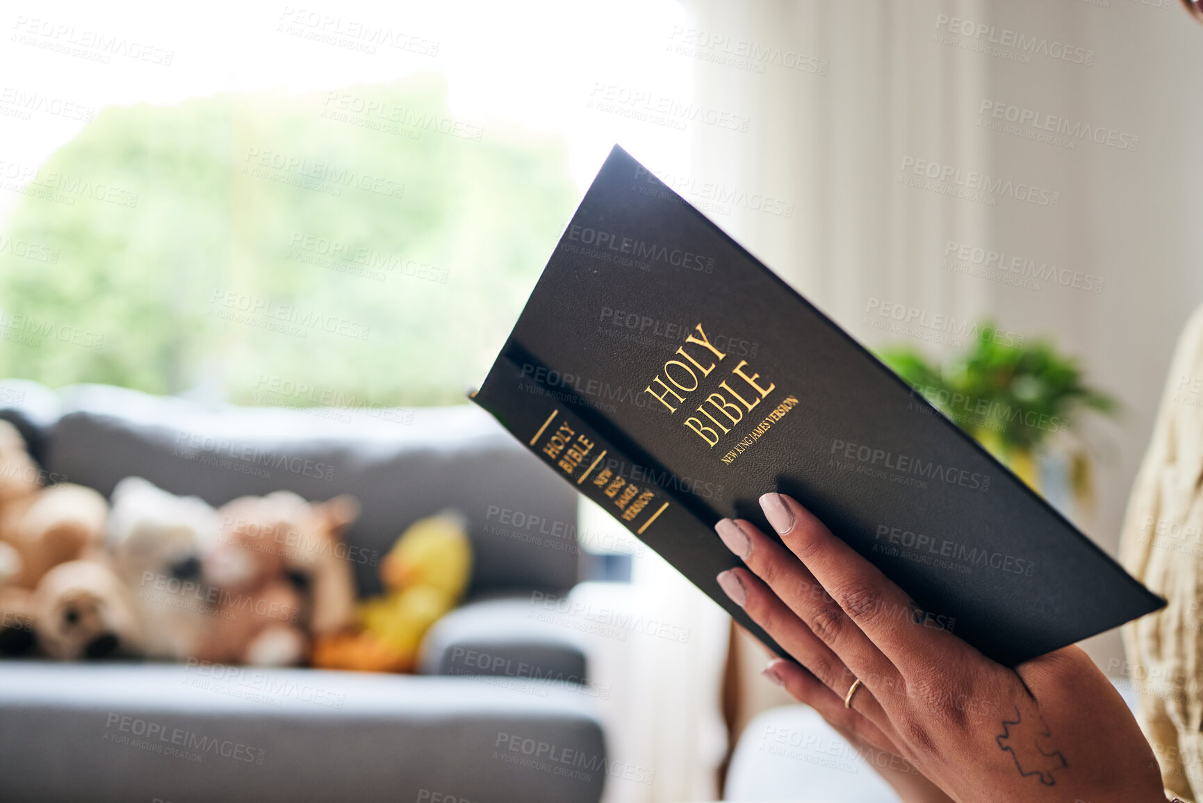 Buy stock photo Closeup, bible and hands in home for faith, studying religion or mindfulness with holy spiritual scripture. Christian literature, reading and ethics for knowledge, language or woman with Jesus Christ