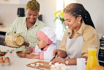 Buy stock photo Cooking, gay family and a child in home kitchen for learning, development and love. Adoption, lesbian or lgbtq women or parents and a happy young kid together to cook food with care, help and support