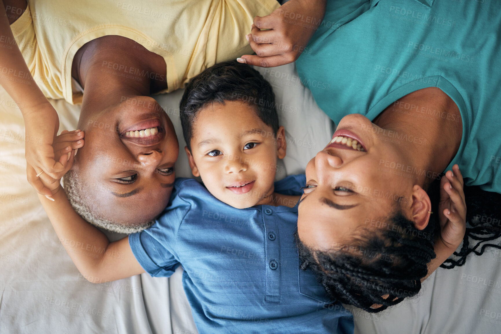 Buy stock photo LGBT family, child and happy portrait on bed in home bedroom for security, quality time and love. Adoption, lesbian or gay women or parents with a foster kid for care or relax in morning from above