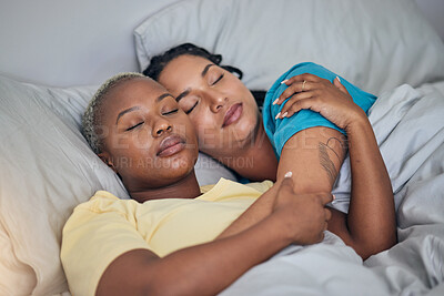 Buy stock photo LGBT, bed and relax women sleeping for home wellness, rest and tired together for stress relief, fatigue or calm. Nap, cuddle and young gay people, bisexual partner or lesbian couple dream in bedroom