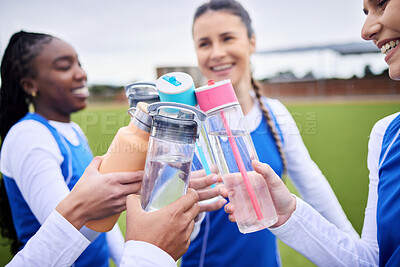 Buy stock photo Sports women group, grass and bottle in circle for toast, celebration and diversity with team building, Girl friends, cheers and success with winning, goal and outdoor for training, wellness or water