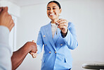Moving in, house keys and female realtor shaking hands for congratulations with homeowner clients. Happy, real estate and young woman agent doing a professional agreement handshake with people.