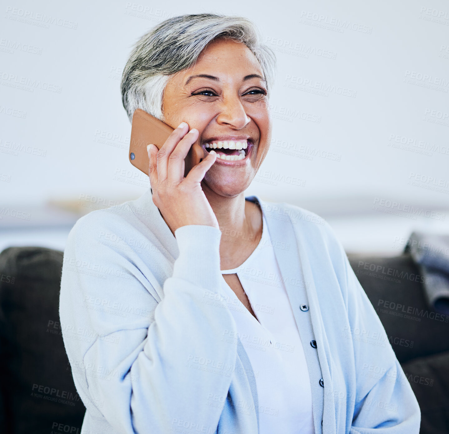 Buy stock photo Happy senior woman, phone call and laughing for funny joke, conversation or meme on sofa at home. Elderly female person laugh and smile for fun discussion on mobile smartphone for comedy in house