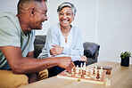 Senior couple, playing chess and home for thinking, strategy or mindset with excited smile, relax or bonding. Elderly woman, man and sofa for board game, ideas or brainstorming for challenge in house