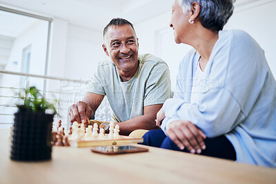 Buy stock photo Senior couple, playing chess and happy for thinking, strategy or mindset with excited smile, relax or bonding. Elderly woman, man and sofa for board game, idea or moving for win, challenge and home