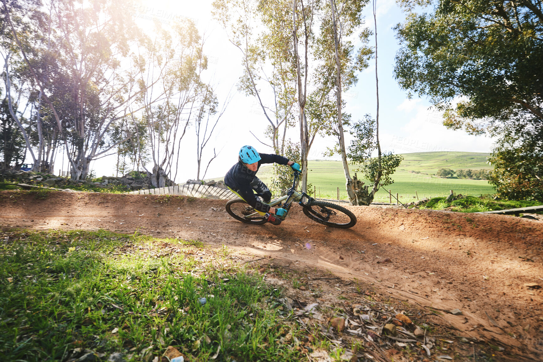 Buy stock photo Mountain bike, man and cycling in forest for competition, freedom and off road adventure on path. Athlete, extreme sports and bicycle for action, cardio race and adrenaline in nature, park and trail 