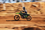 Motorcycle, sports and man in the countryside for fitness, adrenaline and speed training outdoor. Dirt road, bike and male driver on motorbike with freedom, performance and moto stunt hobby in nature