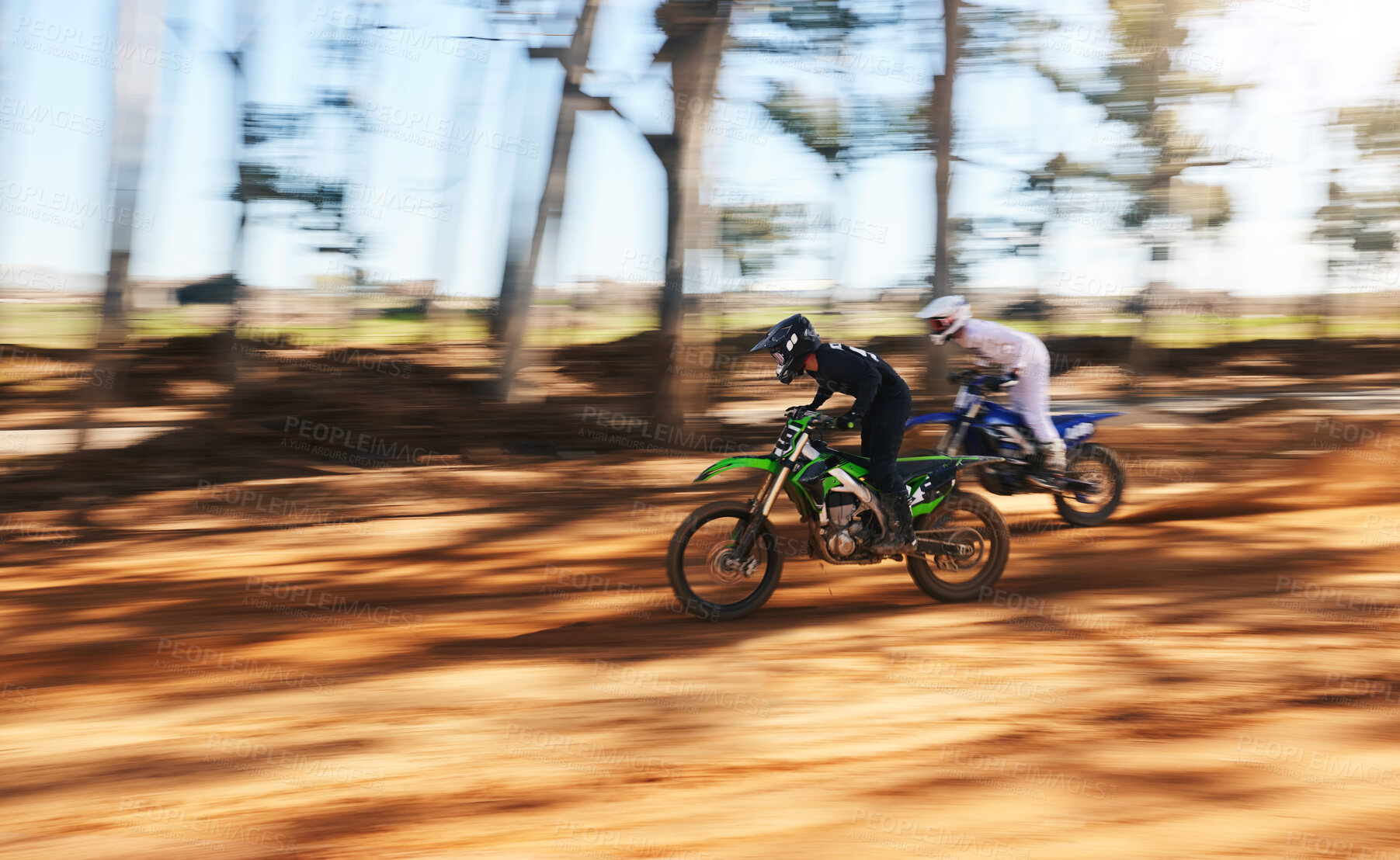 Buy stock photo Race, motorbike and sports, men with speed for practice and training in fast adventure. Professional dirt biking, motion blur and off road motorcycle competition, performance and challenge in woods.