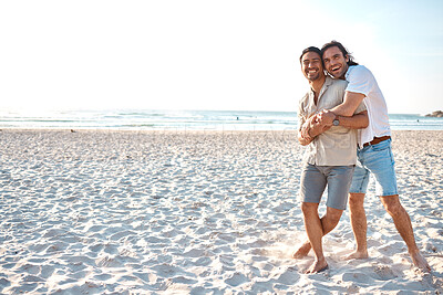 Buy stock photo Love, hug and gay men on beach, mockup and laugh on summer vacation together in Thailand. Sunshine, ocean and romance, happy lgbt couple embrace in nature for fun holiday with pride, sea and sand.