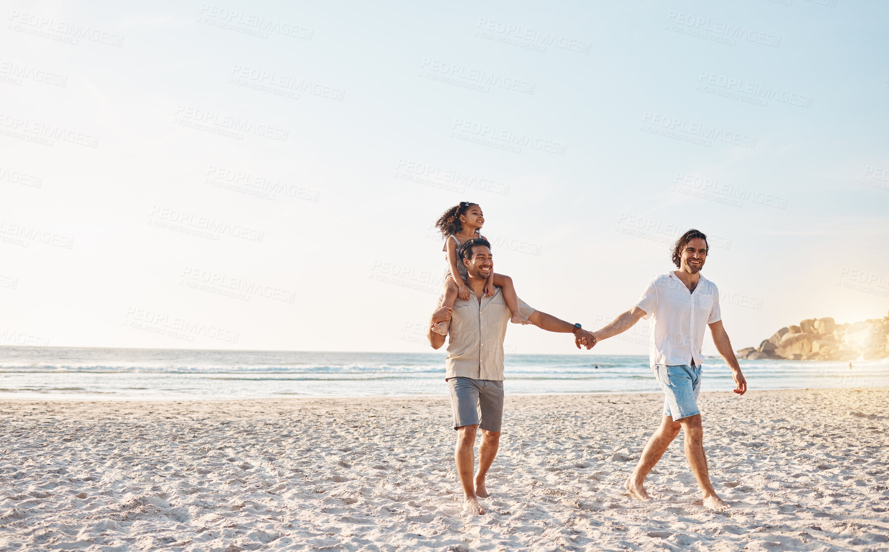 Buy stock photo Lgbt parents on beach, men and child holding hands in summer, walking and island holiday together. Love, happiness and sun, gay couple on tropical ocean vacation with daughter on piggy back mockup.