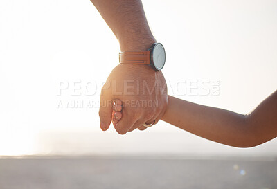 Buy stock photo Parent, father or kid holding hands in park in countryside nature together for support or care. Family, closeup or dad with child bonding or walking on holiday vacation with love, unity or trust 