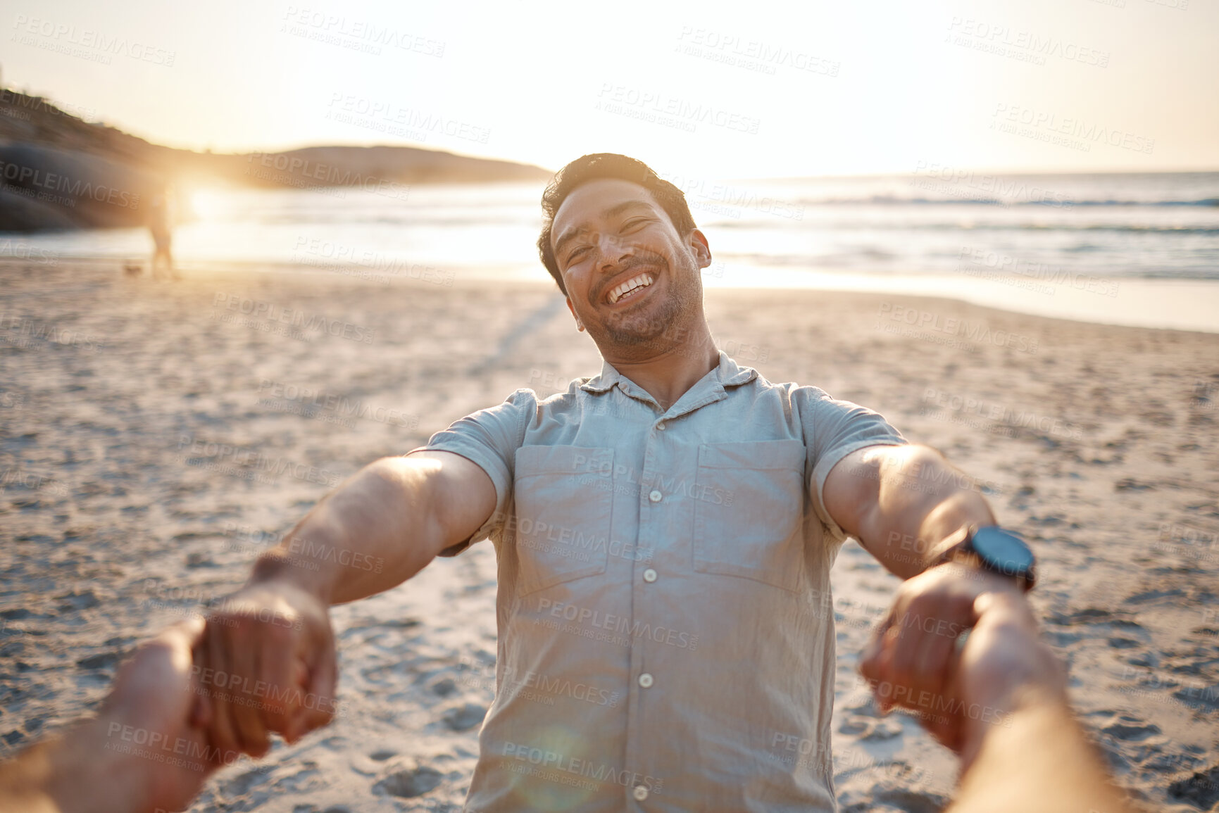 Buy stock photo Happy, portrait and a couple holding hands at the beach for swinging, care and love on vacation. Sunset, travel and an Asian man with a person for freedom, summer fun or support on holiday at the sea