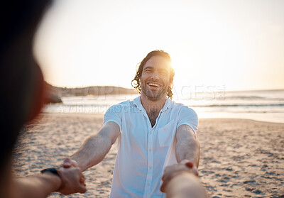 Buy stock photo Man, holding hands and beach with pov, excited and happy for love, romance and freedom in sunset by ocean. People, together and comic laugh on sand, sea and waves for vacation, holiday or honeymoon