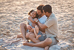 Gay couple on beach, playing with child and family on holiday picnic together with games and laughing. Love, happiness and sun, lgbt parents on tropical ocean vacation with daughter on island sand.