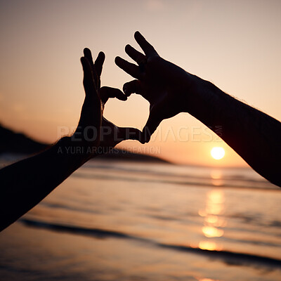Buy stock photo Beach sunset, nature silhouette and person with heart hands sign for love, freedom and ocean vacation. Adventure, emoji health icon and couple support with natural wellness, tropical care or shape