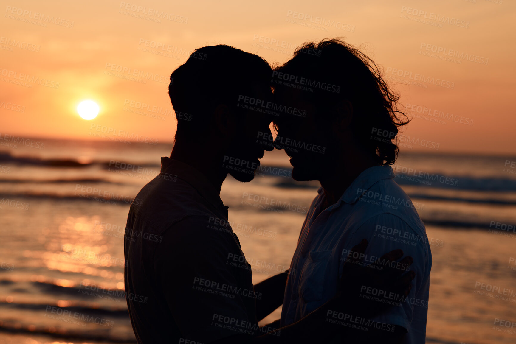 Buy stock photo Silhouette, kiss and gay couple on beach, sunset and love on summer island vacation together in Thailand. Sunshine, ocean and romance, lgbt men in nature and fun holiday with pride, sea and waves.