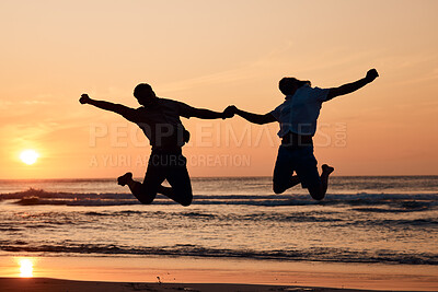 Buy stock photo Beach sunset, shadow silhouette and couple jump, holding hands and having fun, bonding and enjoy nature freedom. Sky, tropical ocean sea and excited people celebrate outdoor travel on spring vacation