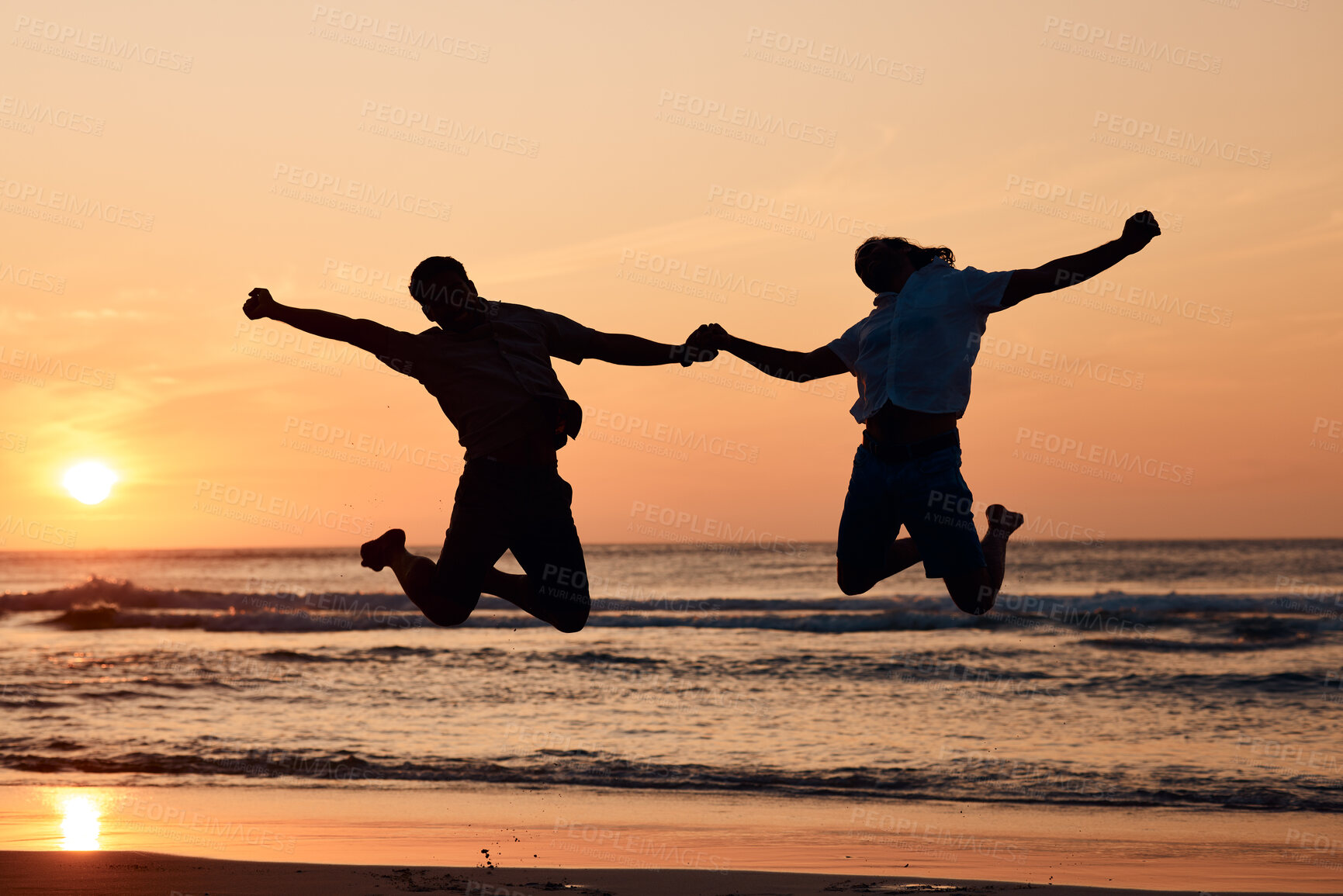 Buy stock photo Beach sunset, shadow silhouette and couple jump, holding hands and having fun, bonding and enjoy nature freedom. Sky, tropical ocean sea and excited people celebrate outdoor travel on spring vacation