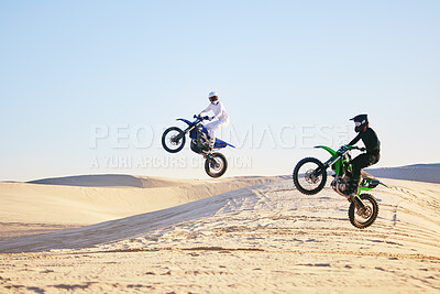 Buy stock photo Motorcycle, desert and jump in air, speed and competition at  outdoor race for performance, goal or off road. Motorbike athlete, dune and ramp in nature, sand or together for training in mockup space