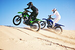 Motorcycle, desert dune and fast in race, contest or outdoor hill climb for performance, goal or off road. Motorbike athlete, race or ramp in nature, sand or together for training in summer sunshine