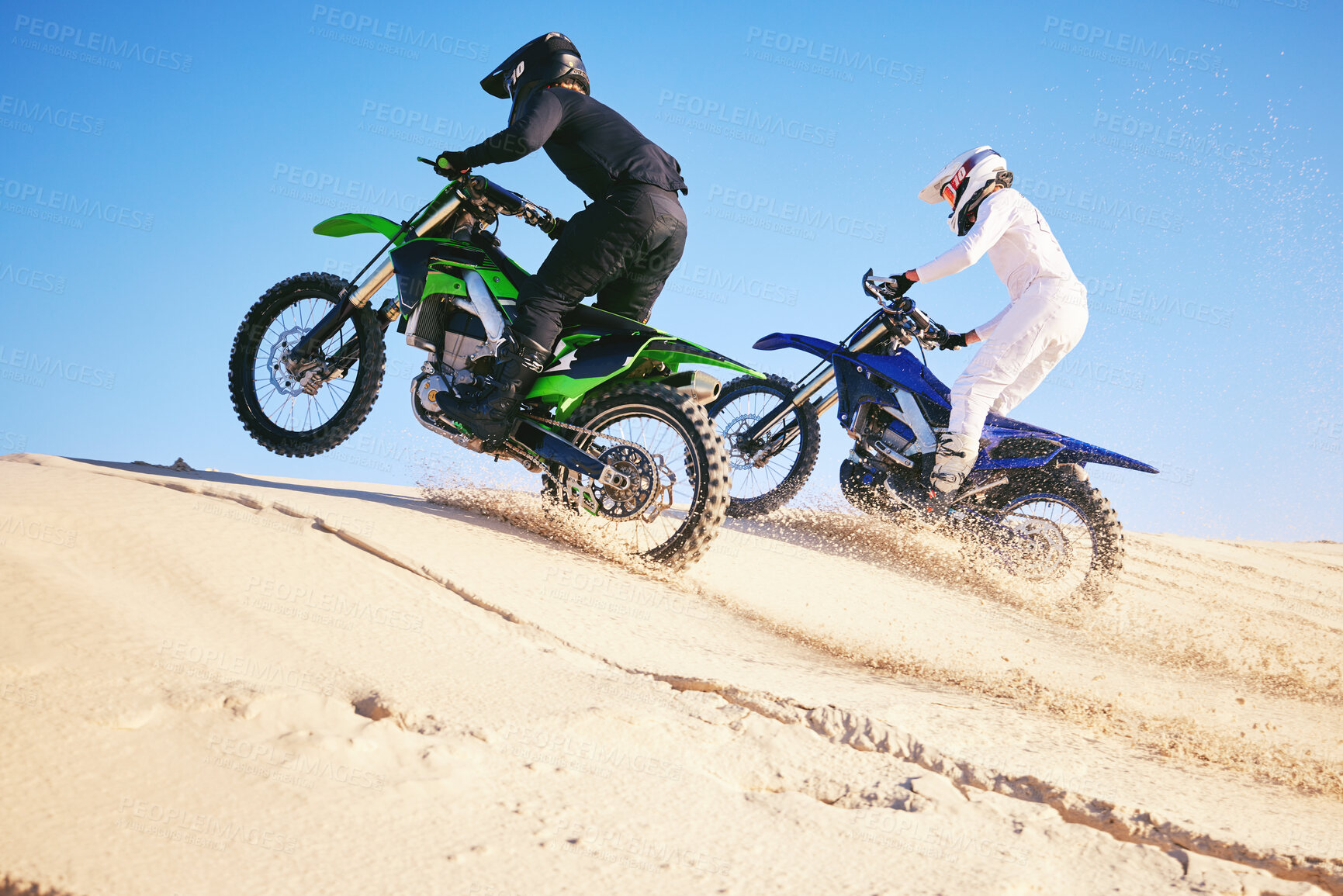 Buy stock photo Motorcycle, desert dune and fast in race, contest or outdoor hill climb for performance, goal or off road. Motorbike athlete, launch or ramp in nature, sand or speed for training in summer sunshine