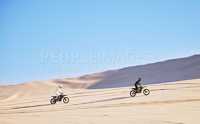 Buy stock photo Bike, sand and race with people in the desert for adrenaline, adventure or training in nature. Sports, energy and freedom with friends in a remote location for a motorcycle competition in Dubai