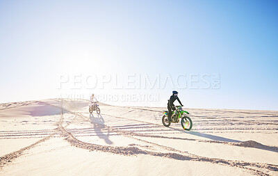 Buy stock photo Bike, sports and race with people in the desert for fitness or an adrenaline hobby for freedom. Motorcycle, training and summer with athlete friends riding a vehicle in Dubai for energy or balance
