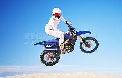 Buy stock photo Blue sky, motorbike in air and person with action and extreme sport, speed outdoor and mockup space. Adventure, fitness and training, motorcycle jump stunt and freedom, challenge and performance