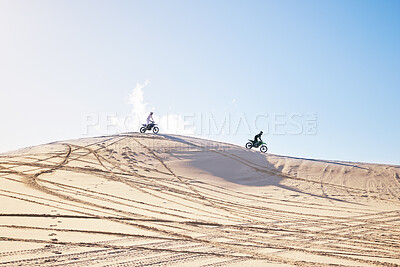 Buy stock photo Desert, motorbike race or sports person travel, journey and driving on off road rally, outdoor challenge or bike competition. Fast motorcycle, speed or extreme athlete training on sand dunes in Dubai