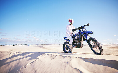 Buy stock photo Sand, motor sports and man with motorbike for adrenaline, adventure and freedom in desert. Action, extreme challenge and male person on bike on dunes for training, exercise and race or competition