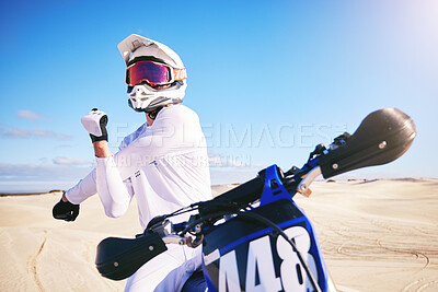 Buy stock photo Sports, cycling and man stretching on motorbike on sand for adrenaline, adventure and freedom in desert. Fitness, extreme action and male person on bike on dunes for training, exercise and challenge