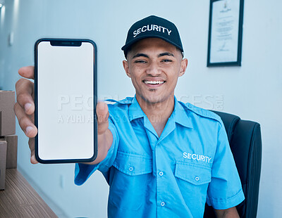 Buy stock photo Security guard man, portrait and mobile phone screen for mockup space for promo, ux or smile in workplace. Young safety office, surveillance agent or blank smartphone for app branding in control room