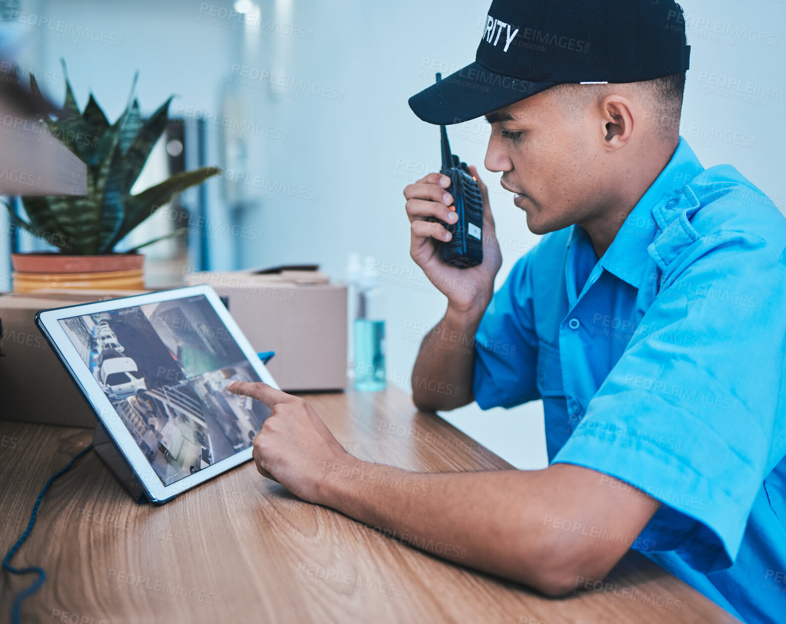 Buy stock photo Security guard, walkie talkie and man on tablet in surveillance, cctv system and smart monitor. Technology, camera and serious officer on radio at desk in safety, investigation service and automation