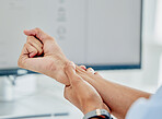 Hand, work and a person with an injury or pain of a muscle from corporate or typing stress. Closeup, business and an employee with an arm problem, burnout symptom or massage after an accident