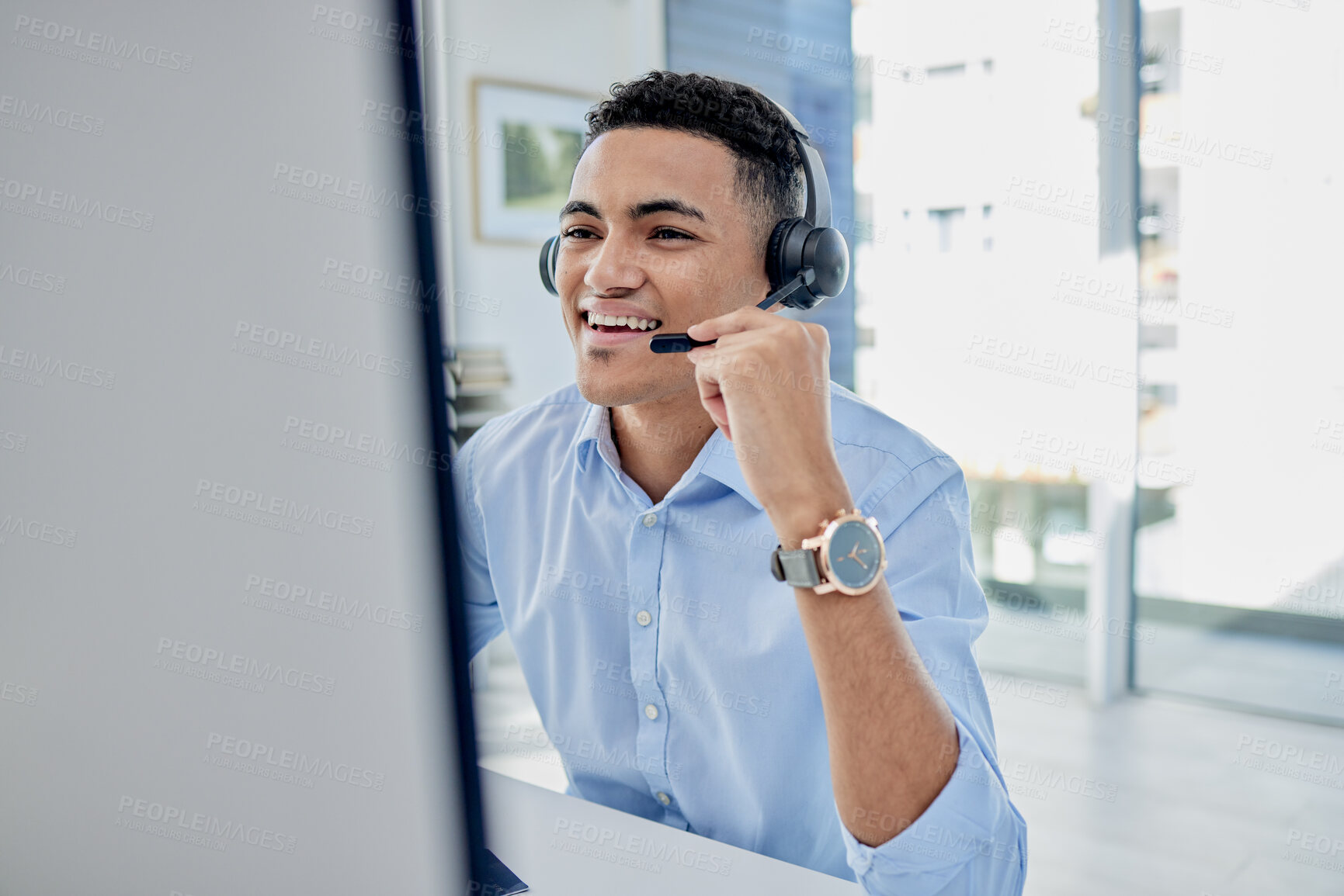 Buy stock photo Customer support, call center and male agent in the office doing an online consultation. Contact us, crm and professional young man telemarketing consultant on a call with a headset in the workplace.