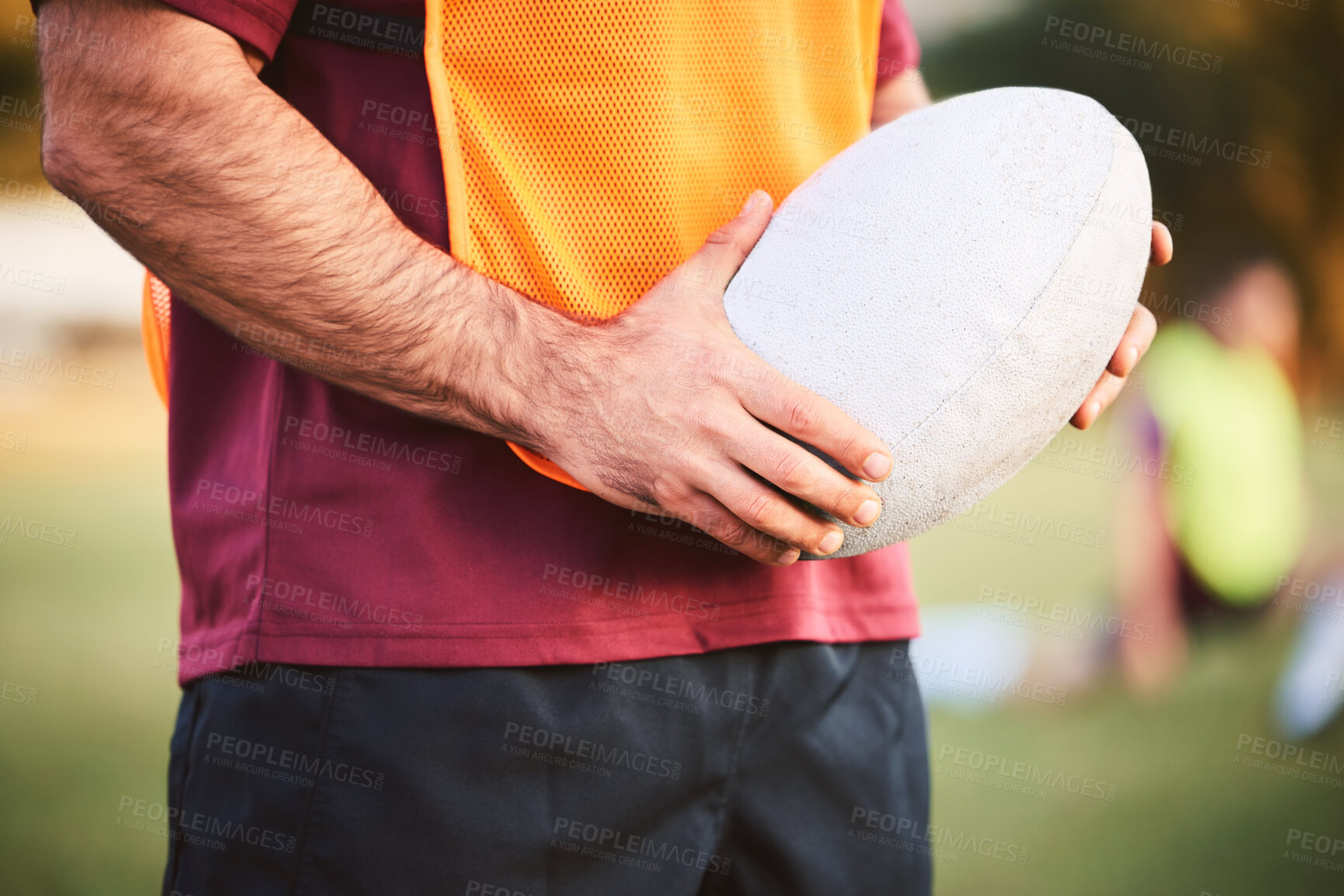Buy stock photo Rugby, man and hands with ball for outdoor games, competition and contest on field. Closeup of athlete, sports player and match at stadium for fitness, exercise and performance challenge on pitch 