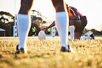 Legs, ball and rugby, sports on field outdoor with team, target with fitness and train for match. Exercise, athlete people and play game with practice, health and active with grass, skill ad player