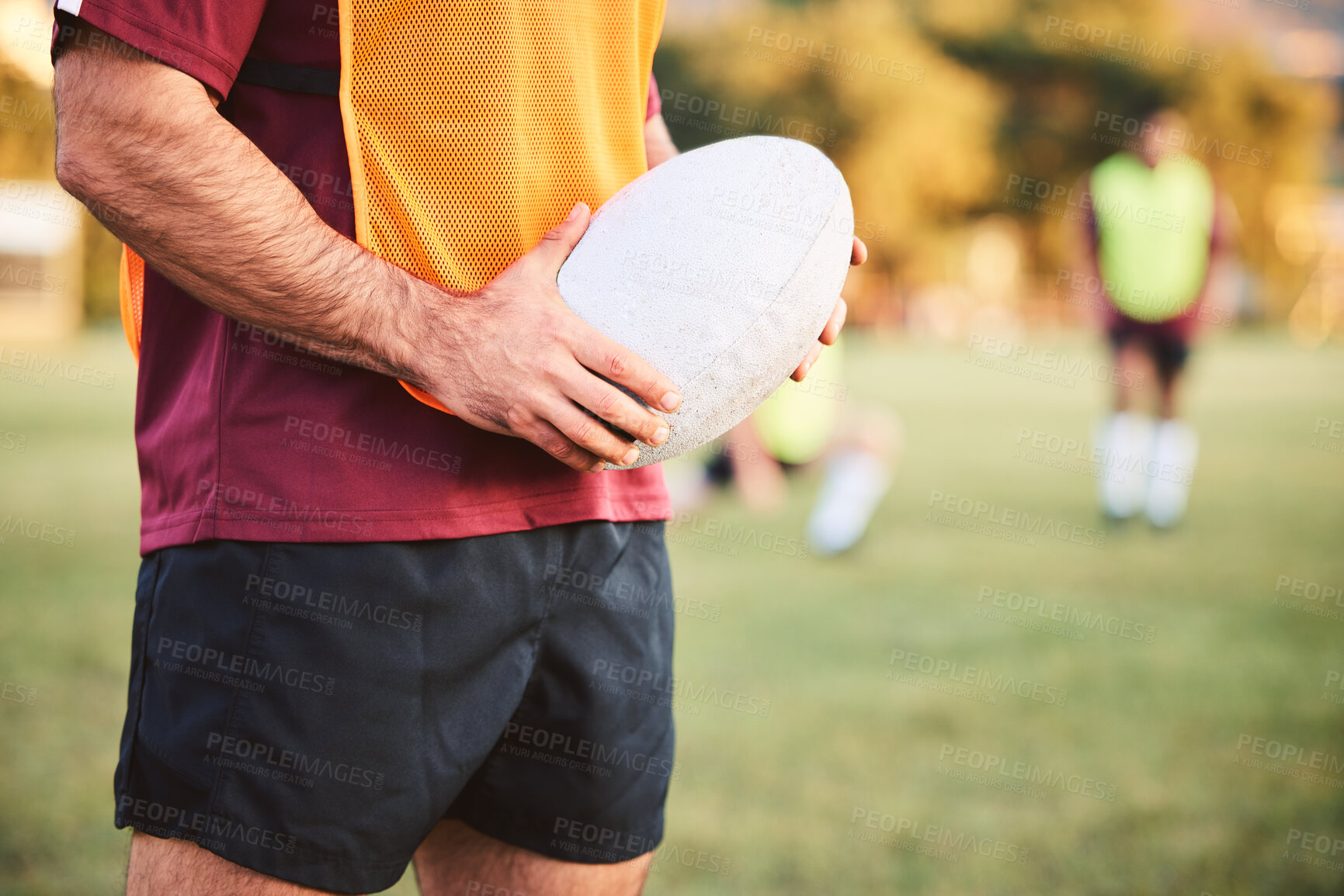 Buy stock photo Rugby, man and hands with ball for sports games, competition and contest on field. Closeup of athlete, team player and training at stadium for fitness, exercise and performance of challenge outdoor 