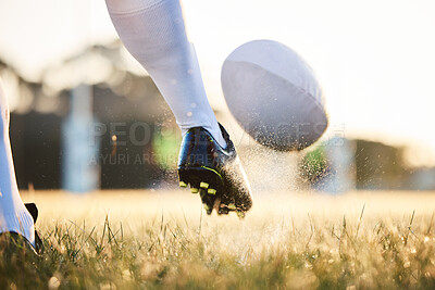 Buy stock photo Rugby ball, feet kick and sport game with support, exercise and competition with athlete training. Field and target practice on grass with cardio, fitness and workout with shoe and boot closeup