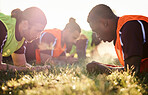 Sports, team and soccer group plank on field for fitness training, workout or exercise core outdoor in summer. Football player, club and athletes, men and focus for strength or sport challenge