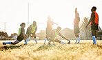 Sports, fitness and a rugby team stretching on a field at training in preparation for a game or match together. Exercise, teamwork and warm up with an athlete group getting ready for practice