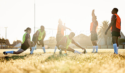 Buy stock photo Sports, fitness and a rugby team stretching on a field at training in preparation for a game or match together. Exercise, teamwork and warm up with an athlete group getting ready for practice