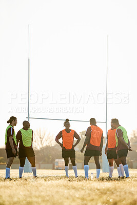 Buy stock photo Rugby, training and men on field for motivation at game, match or practice workout together. Sports, fitness and team at poles on grass with energy, talent and inspiration for winning at challenge.