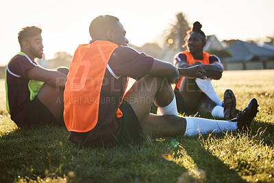 Buy stock photo Rugby, team and men relax on field outdoor, talking and communication at sunrise in the morning. Sports, athlete group and players sitting on grass after exercise, training or friends workout in game