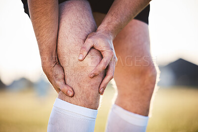Buy stock photo Knee pain, man with injury and fitness accident, athlete outdoor with cramps and muscle tension. Exercise, sports and male person with hands on leg, health crisis and rugby player with inflammation