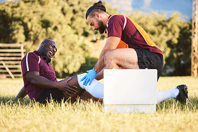 Buy stock photo Black man, knee pain and injury, medic help athlete and sports accident on field with health and wellness. Bandage leg, male healthcare worker and support with medical care, inflammation and fracture