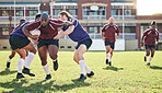 Rugby, training and tackle with a team on a field together for a game or match in preparation of a competition. Sports, fitness and running with a group of men outdoor on grass for club practice